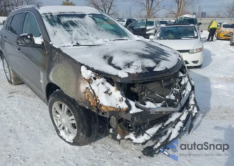 2012 Cadillac Srx Luxury Collection z USA, uszkodzony, nr VIN 3GYFNAE34CS574094